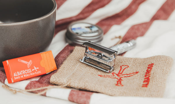 zero-waste shaving kit with butterfly safety razor, reusable stainless steel razor blades, hemp bag, eucalyptus shaving soap and blade take back program envelope to recycle blades